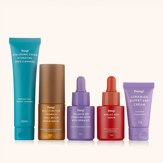 Set of skincare products with colorful packaging on a white background