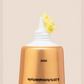 An Image of the a yellow coloured face cream coming out of a tube