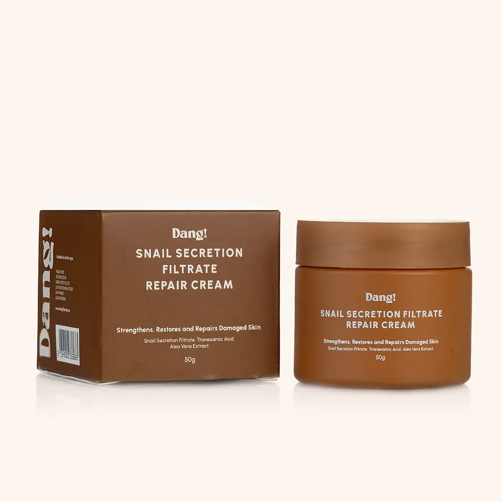 A cup of face moisturizer with snail secretion filtrate