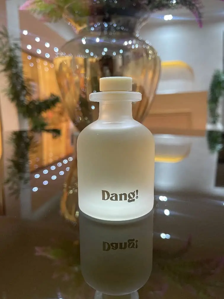 An image of a reed diffuser jar with diffuser oil inside