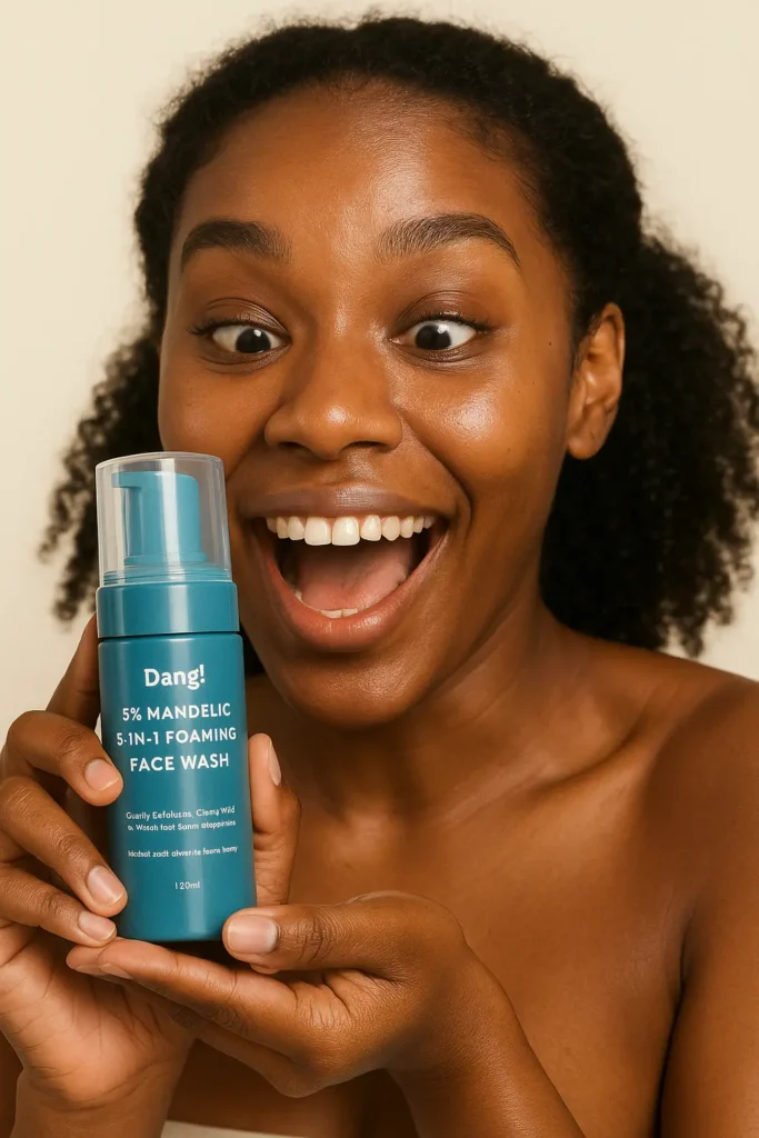 An image of a dark skinned woman holding a mandelic acid face wsh, a very good skincare product for oily skin